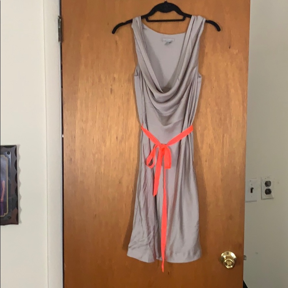 Silver satin dress with orange tie belt